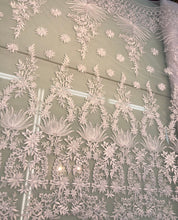 White bridal lace 52â wide.  Beautiful white bridal lace, border style white bridal lace fabric sold by the yard.