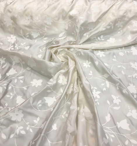 100% silk twill with embosed floral design, beautiful ivory color 60" wide silk fabric sold by the yard