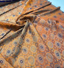 Burnt orange brocade 48&quot; wide   Beautiful burnt orange brocade fabric sold by the yard