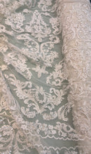 Hand beaded re-embroided bridal lace, 52” wide