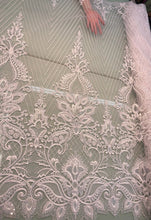 White bridal lace 52&quot; wide   Beautiful white      re embroidered bridal border style lace fabric sold by the yard