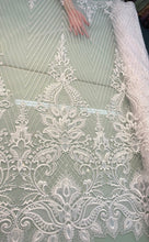 White bridal lace 52&quot; wide   Beautiful white      re embroidered bridal border style lace fabric sold by the yard