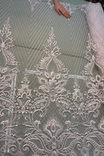 White bridal lace 52&quot; wide   Beautiful white      re embroidered bridal border style lace fabric sold by the yard