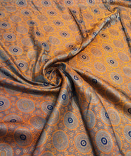 Burnt orange brocade 48&quot; wide   Beautiful burnt orange brocade fabric sold by the yard
