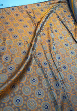 Burnt orange brocade 48&quot; wide   Beautiful burnt orange brocade fabric sold by the yard