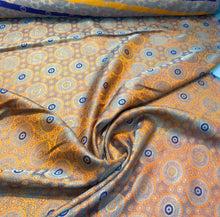 Burnt orange brocade 48&quot; wide   Beautiful burnt orange brocade fabric sold by the yard