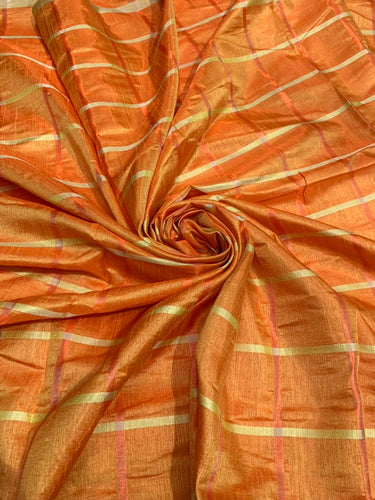 Viscose poly silky crepe check 44" wide    Beautiful orange gold check sold by the yard