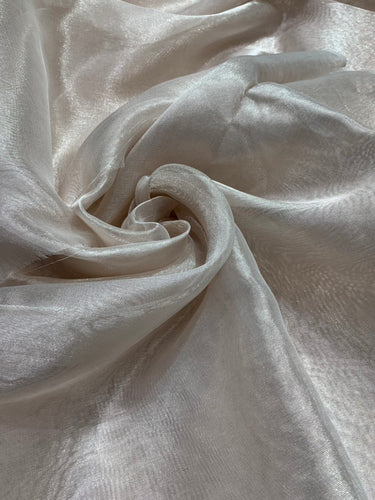 Matalic tissue organza 44" wide   Beautiful ivory color sold by the yard   Best if used for appreal & home decor