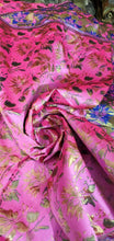 Fushia pink blue doubke faced brocade 45&quot; wide.  Beautiful fusia gold blue brocade sold by the yard.  Best use for theatrical costumes