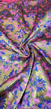 Fushia pink blue doubke faced brocade 45&quot; wide.  Beautiful fusia gold blue brocade sold by the yard.  Best use for theatrical costumes