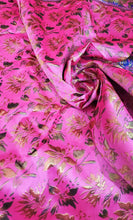 Fushia pink blue doubke faced brocade 45&quot; wide.  Beautiful fusia gold blue brocade sold by the yard.  Best use for theatrical costumes