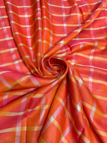 Viscose poly silk soft crepe check 44" wide   Beautiful burnt orange colors sold by the yard