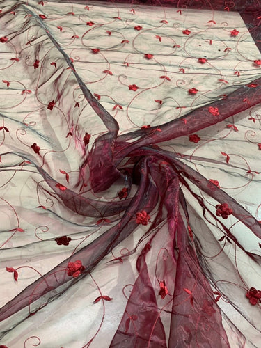 Organza floral embroidered fabric 60" wide   Beautiful wine color embroidered organza sold by the yard