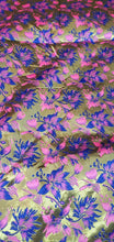 Fushia pink blue doubke faced brocade 45&quot; wide.  Beautiful fusia gold blue brocade sold by the yard.  Best use for theatrical costumes