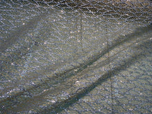 Glitter Metallic tule fabric useable for apparel, party decorations & much more..... 58â wide beautiful silver with gold on mesh