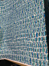 Designer digital print on Charmeuse fabric 54â wide.  Beautiful ivory base with blues combination sold by the yard.  Best use for Appearel