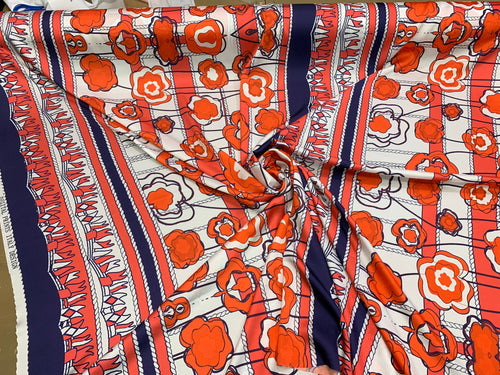 Designer digital printed Charmouse fabric 54â wide.  Beautiful ivory base with red blues color sold by the yard.  Best use for apparel