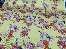 Designer digital printed Charmouse 54â wide.  Beautiful yellow base with colorful flowers print sold by the yard. Best use for apparel