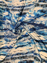 Designer digital printed Charmouse fabric 54â wide.  Beautiful ivory base with blues printed fabric sold by the yard.  Best use for apparel