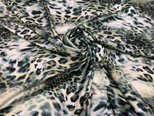 Designer digital printed Charmouse fabric 54â wide.  Beautiful digital printed Charmeuse fabric sold by the yard. Beat use for apparel