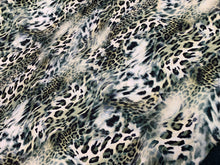 Designer digital printed Charmouse fabric 54â wide.  Beautiful digital printed Charmeuse fabric sold by the yard. Beat use for apparel