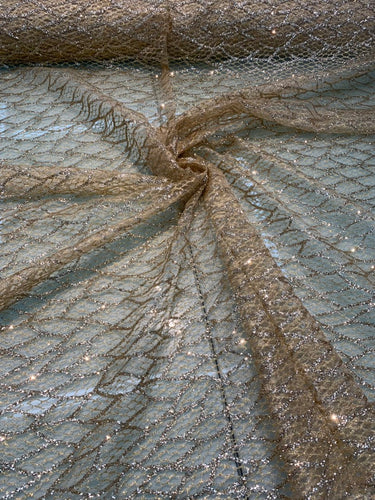 Glitter Metallic tule fabric useable for apparel, party decorations and much more... 58â wide beautiful gold silver color