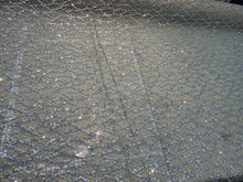 Glitter Metallic tule fabric useable for apparel, party decorations & much more..... 58â wide beautiful silver with gold on mesh