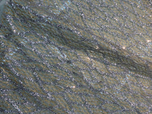 Glitter Metallic tule fabric useable for apparel, party decorations & much more..... 58â wide beautiful silver with gold on mesh