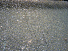 Glitter Metallic tule fabric useable for apparel, party decorations & much more..... 58â wide beautiful silver with gold on mesh