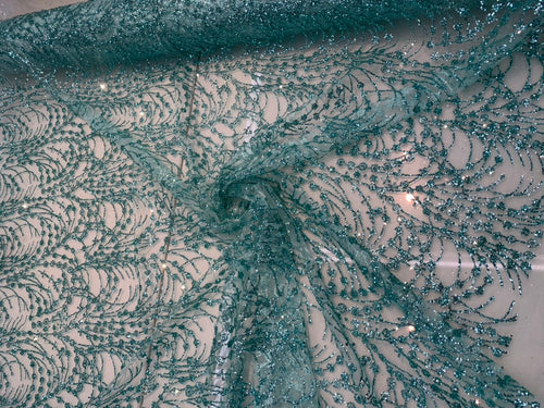 Glitter Metallic tule fabric useable for apparel, party decorations & much more.... 56â wide beautiful turquoise color