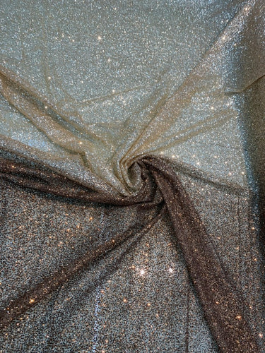 Glitter Metallic tule fabric useable for apparel, party decoration etc & much more....... 56â wide beautiful copper gold Ombre glitter