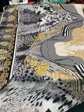 Satin Charmouse digital print 54â wide. Beautiful soft silky Charmouse designer print. Sold by the yard.