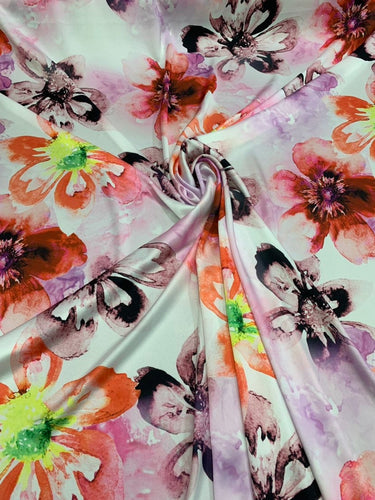 Satin Charmouse digital print 54â wide.  Beautiful ivory base multi color  floral print best used for apparel.  Sold by the yard