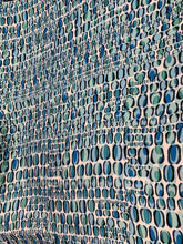 Designer digital print on Charmeuse fabric 54â wide.  Beautiful ivory base with blues combination sold by the yard.  Best use for Appearel