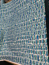 Designer digital print on Charmeuse fabric 54â wide.  Beautiful ivory base with blues combination sold by the yard.  Best use for Appearel