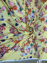 Designer digital printed Charmouse 54â wide.  Beautiful yellow base with colorful flowers print sold by the yard. Best use for apparel