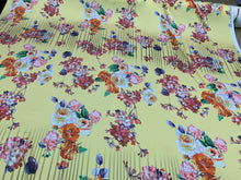 Designer digital printed Charmouse 54â wide.  Beautiful yellow base with colorful flowers print sold by the yard. Best use for apparel