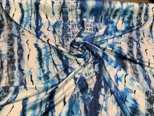 Designer digital printed Charmouse fabric 54â wide.  Beautiful ivory base with blues printed fabric sold by the yard.  Best use for apparel