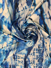 Designer digital printed Charmouse fabric 54â wide.  Beautiful ivory base with blues printed fabric sold by the yard.  Best use for apparel