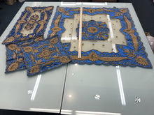 Decorated hand crafted table mates, sold by the set of 4