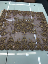 Decorated hand embroidered table mats, sold by the set of 4 pcs.